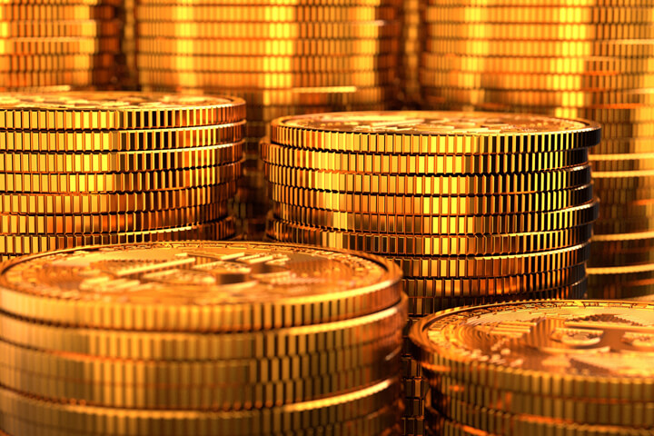 Side photo of many stacks of Bitcoins concept of wealth or cryptocurrency millionaire