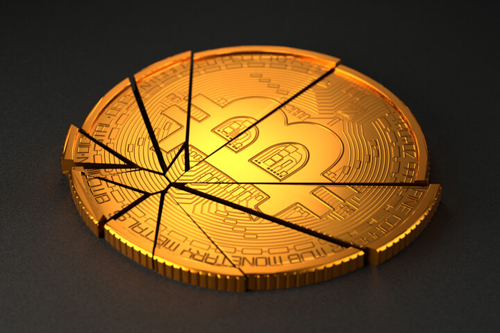 Broken Bitcoin on dark background concept for price crash, market crash, or devaluation