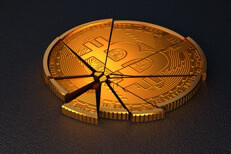 Shattered bitcoin with spot light Broken Bitcoin concept for falling prices, cryptocurrency market crash, or price volatility
