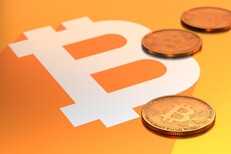 Bitcoin logo with coins Large Bitcoin B with three scattered Bitcoins