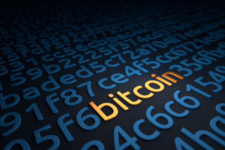 Random encrypted code with word Bitcoin in metallic orange color with blockchain in blue