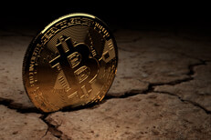 Bitcoin stuck in crack Bitcoin stuck in crack in parched, dry ground