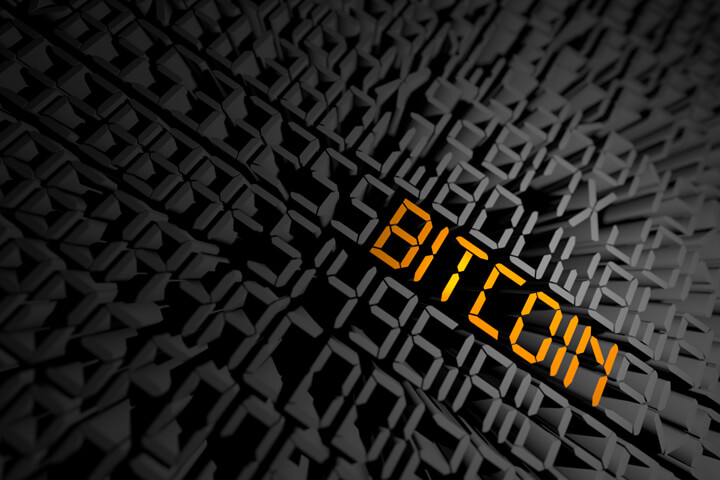 Gold digital Bitcoin text in string of encrypted digital characters different camera angle