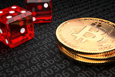 Bitcoin dice roll Small stack of Bitcoins with two dice representing Bitcoin investment risk or cryptocurrency risk