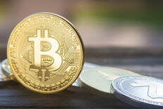 Bitcoin standing on edge in front of altcoins Bitcoin on edge in front of row including Zcash, Ethereum, Ripple, Monero, and Litecoin