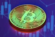 Bitcoin reflecting stock price Bitcoin on reflective surface reflecting candlestick chart from monitor