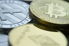 Bitcoin, Ethereum, and Litecoin Free photo of a bitcoin, an Ethereum coin, and a Litecoin