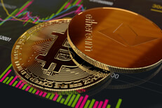 Bitcoin and Ethereum coin on mobile app Bitcoin and Ethereum coins on mobile phone showing stock trading app