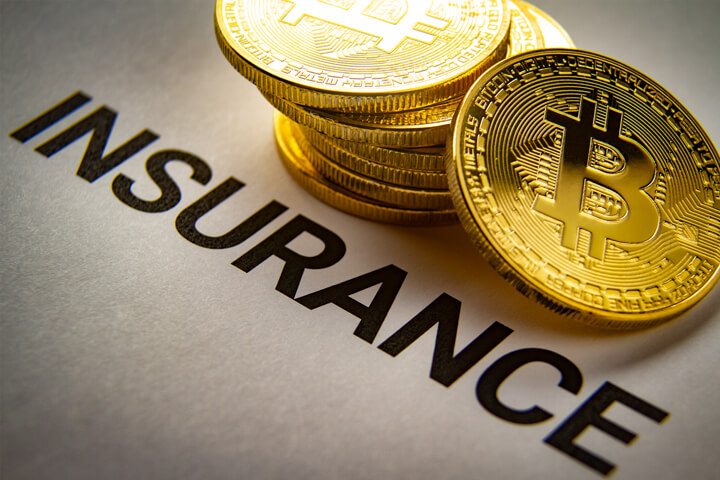 Bitcoin insurance concept photo of stack of Bitcoins on insurance policy