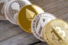 Cryptocurrency coins on wood again Bitcoin, Litecoin, Ethereum, Ripple, and Zcash coins on weathered wood planks