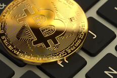Bitcoin on MacBook keyboard Bitcoin on Apple MacBook keyboard