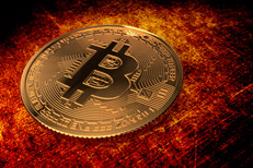 Bitcoin on orange grunge background Bitcoin on grunge background lit in orange and red