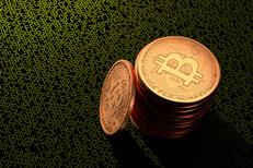 Stack of Bitcoins on green digital code Stack of Bitcoins on dark background with green illuminated digital key or blockchain