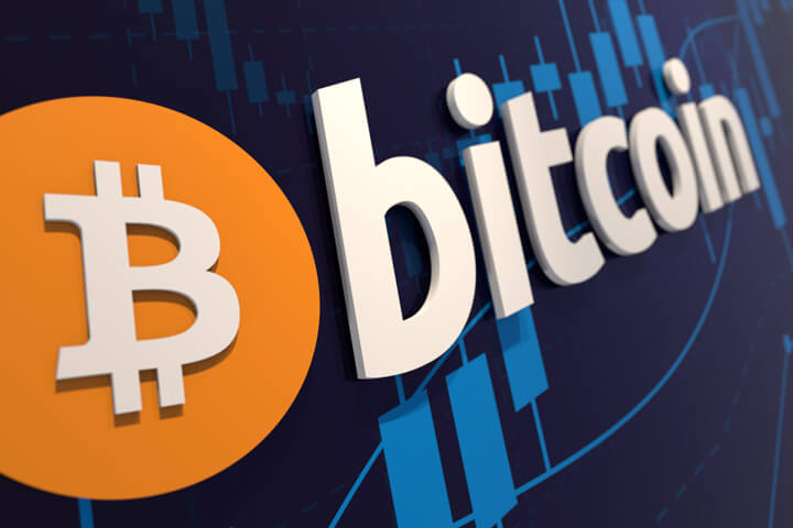 3D Bitcoin logo hanging on wall showing candlestick chart for BTC stock price