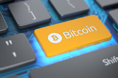 Glowing bitcoin keyboard key Orange bitcoin keyboard key with blue circuit board and blue glowing light