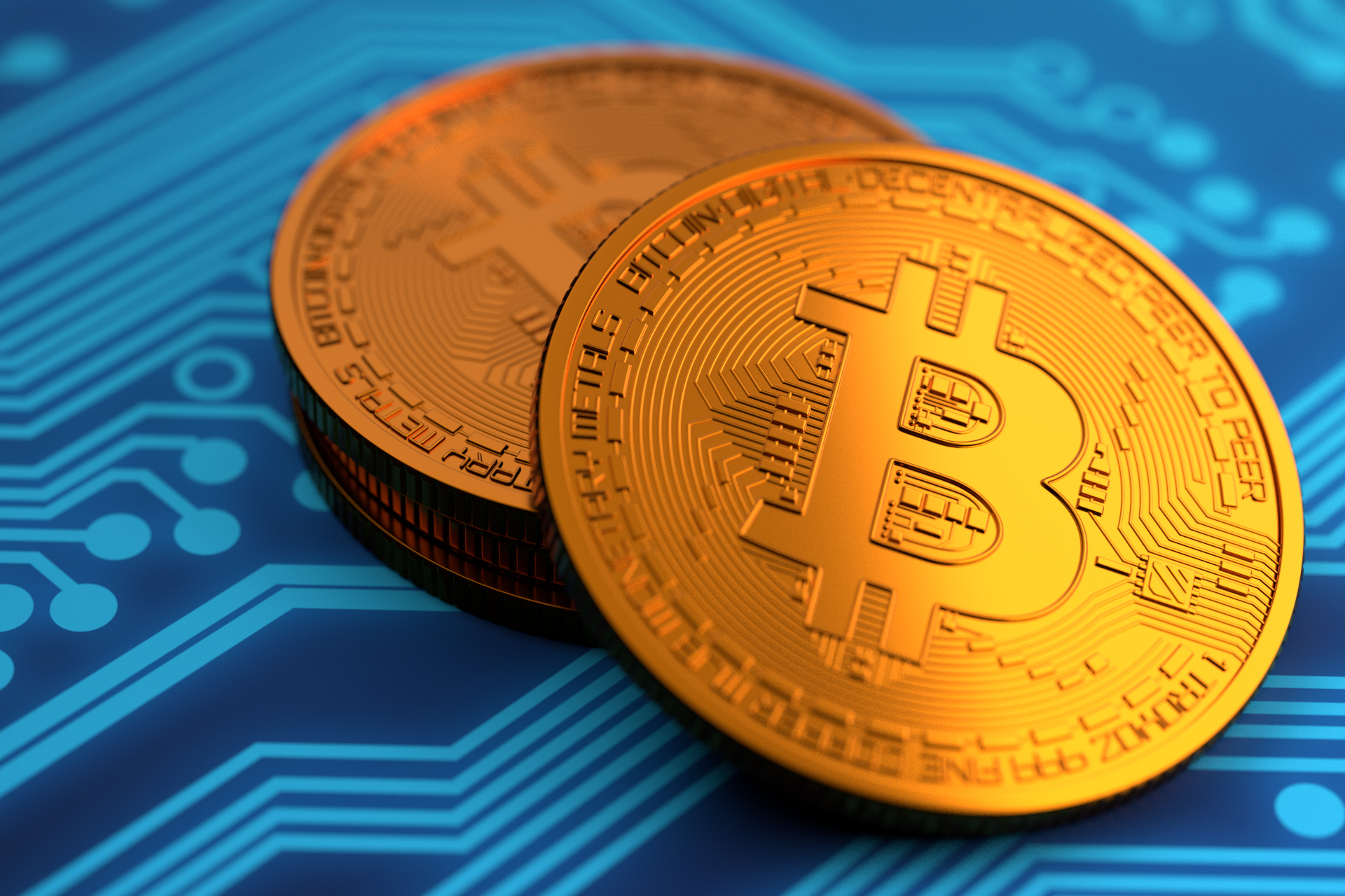 Stack of bitcoins on circuit board free image download