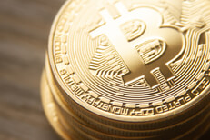 Close view of top of bitcoin stack Close view from top of stack of bitcoins with soft back light