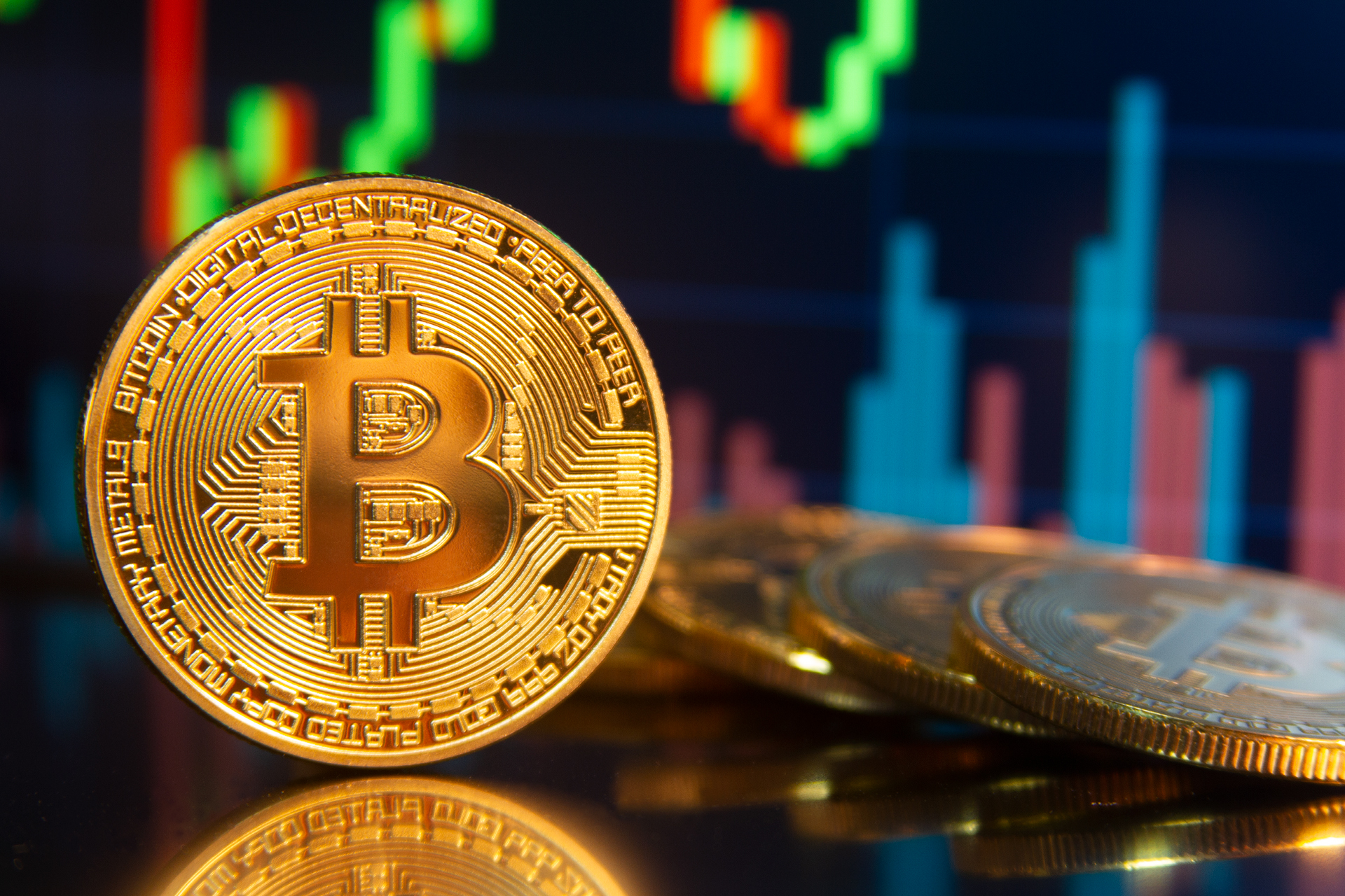Bitcoin on edge in front of stock charts free image download