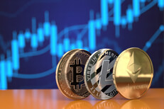 Crypto coins in front of stock chart Ethereum, Litecoin, and Bitcoin on edge in front of stock price candlestick chart