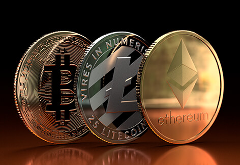 Crypto coins on reflective surface Ethereum, Litecoin, and Bitcoin on edge on reflective orange metallic surface