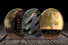 Crypto coins on edge on wood Ethereum, Litecoin, and Bitcoin standing on edge on wood surface