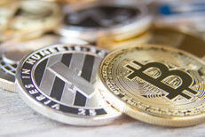 Scattered cryptocurrency coins Scattered cryptocurrency coins with focus on Bitcoin and Litecoin