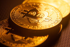 Bitcoins stacked golden light Bitcoins stacked in order with golden light from back