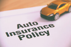 Small car positioned on an auto insurance policy