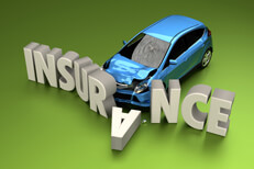 Blue car crashed on green background Auto insurance claim concept photo of car crashed into insurance letters with green background