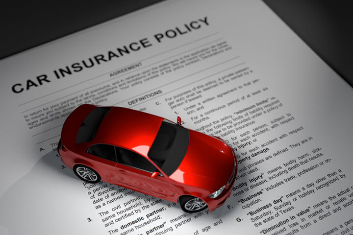 Car insurance policy with small red car