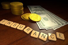 High price for insurance Free image illustrating high cost of car insurance with money and gold coins