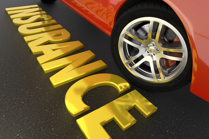 Car insurance concept image showing shiny gold insurance word on asphalt next to red sports car