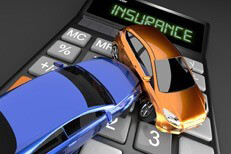 Insurance accident claim concept Two car accident on insurance calculator from top viewpoint