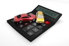 Car accident on calulator isolated Car accident on calculator with LCD showing insurance isolated on white background