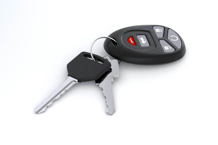 Car keys and key fob isolated on white background