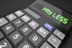 Pay less calculator Calculator on dark background with LCD reading Pay Less
