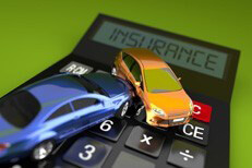 Car crash on insurance calculator Two car accident on insurance calculator with bright green background