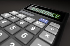 Insurance calculator Insurance calculator on dark background low point of view