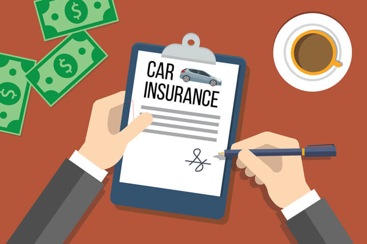 Hands on desktop signing car insurance policy with coffee cup and cash on opposite sides