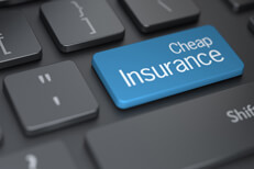 Keyboard with blue cheap insurance key Laptop keyboard with large blue cheap insurance key for finding cheaper insurance online