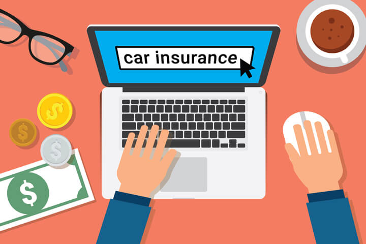 Desktop with laptop, glasses, money, and coffee cup showing hands searching online for car insurance
