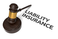 Liability insurance with gavel Gavel with liability insurance text isolated on white