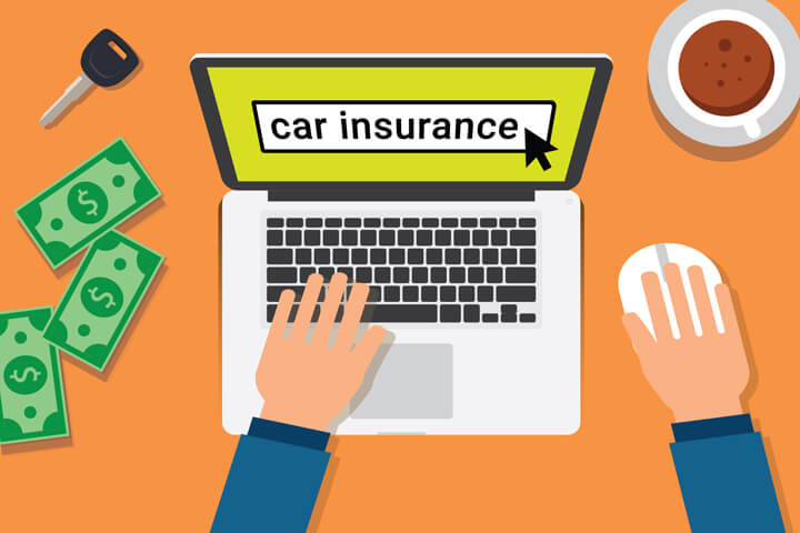 Desktop with laptop, car key, money, and coffee cup showing hands searching online for car insurance or finding better rates