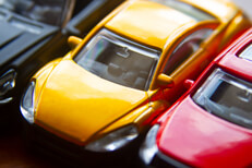 Angled view photo of three toy cars close up