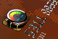 EMV chip with credit score gauge Close up of credit card EMV chip with credit score gauge showing good credit rating