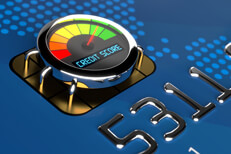 Credit score meter on EMV chip Close up of credit card EMV chip with chrome speedometer style gauge showing good credit score