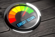 Chrome credit score meter Dashboard style gauge with chrome trim showing dial in green concept for good credit score