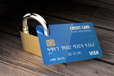 Padlocked blue credit card Padlock on weathered wood credit lock