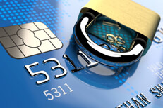 Blue EMV with padlock Small padlock laying next to credit card EMV chip credit lock concept