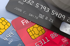 Top view photo of three credit cards with EMV chips